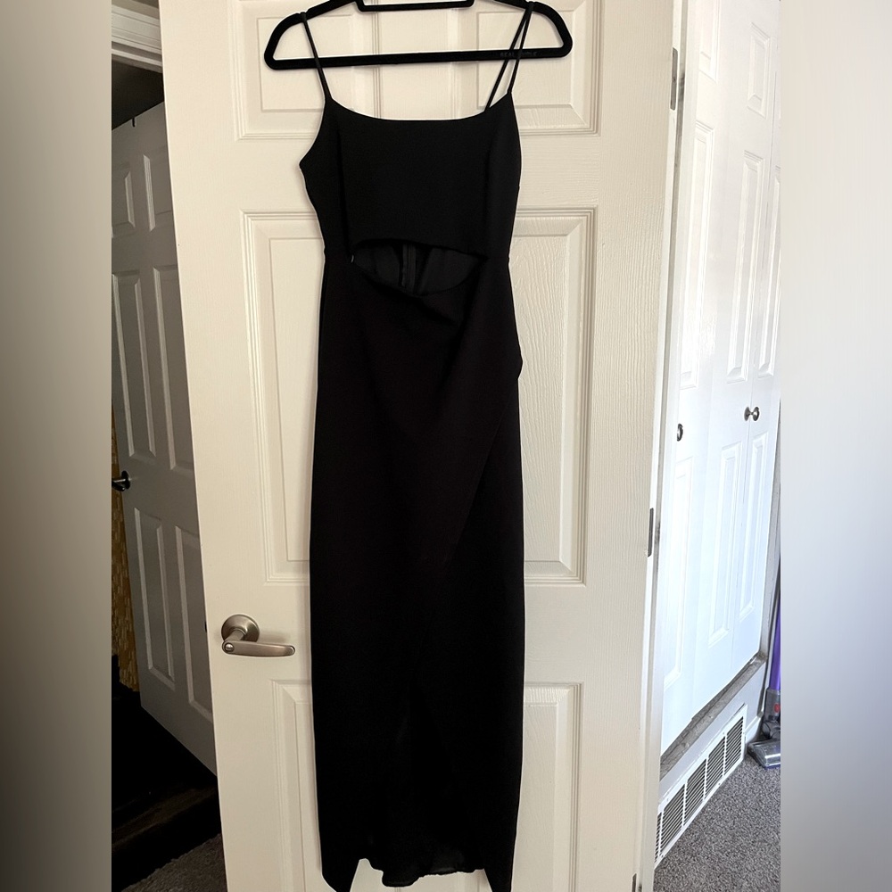 Black Lulu’s dress with a cut-out under the chest and a leg slit. Size medium